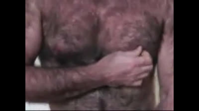 Hairy Daddy Strokes His Cock